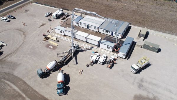 Lowering emissions using calcined clay concrete